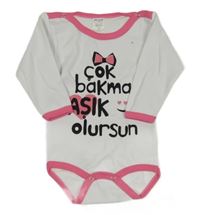 Bílé body s nápisem s mašlí