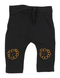 Černošedé melírované turecké tepláky se lvíčky Matalan
